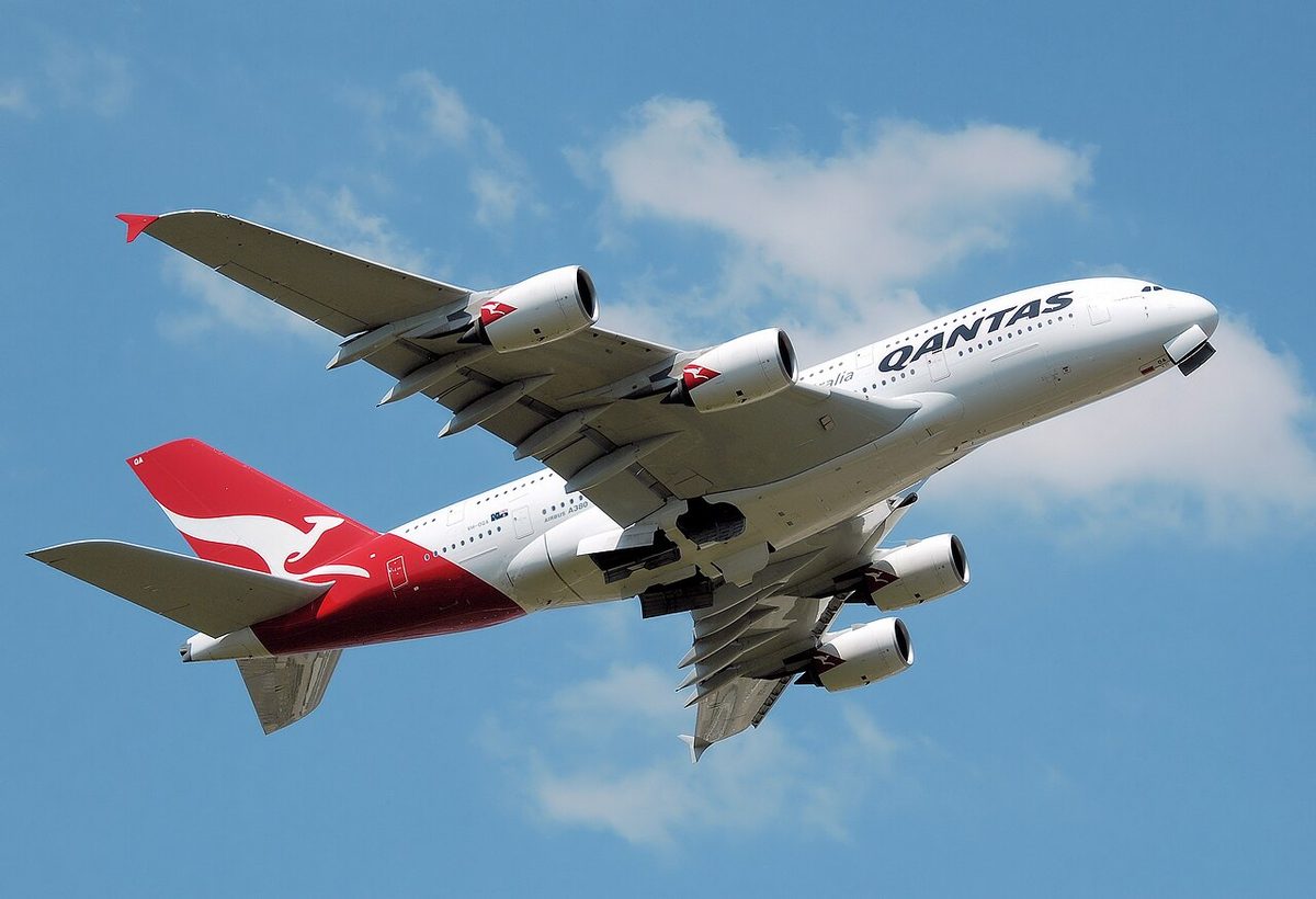 A Qantas Airbus A380 registered VH-OQA climbing away after take-off.