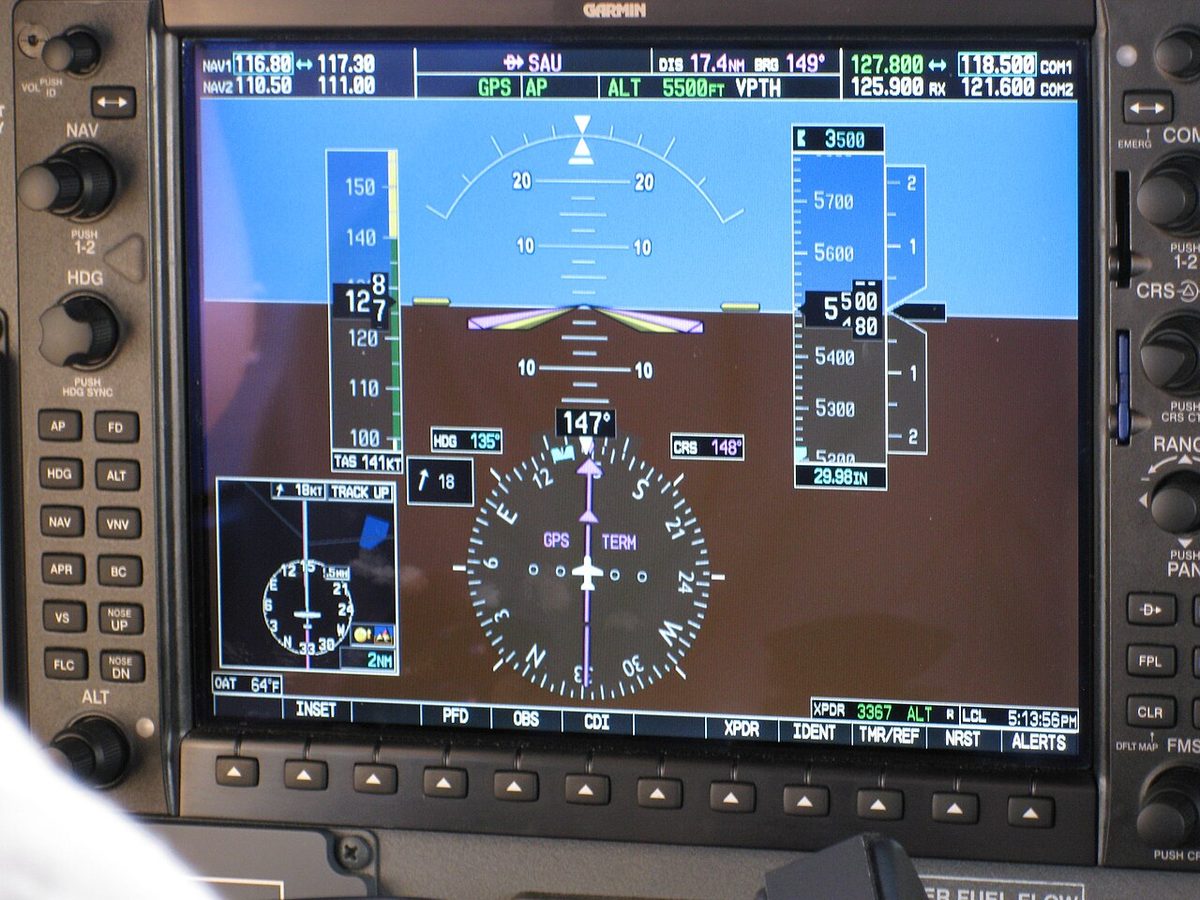 A Garmin G1000 primary flight display with an airspeed tape on the left and TAS 141KT beneath it, an altitude tape on the right with 29.98IN beneath it, and OAT 64°F at the bottom left.