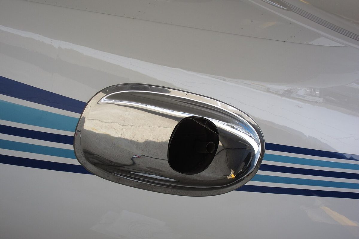 The oval exhaust outlet of the auxiliary power unit on the rear fuselage of a Gulfstream G650 business jet.