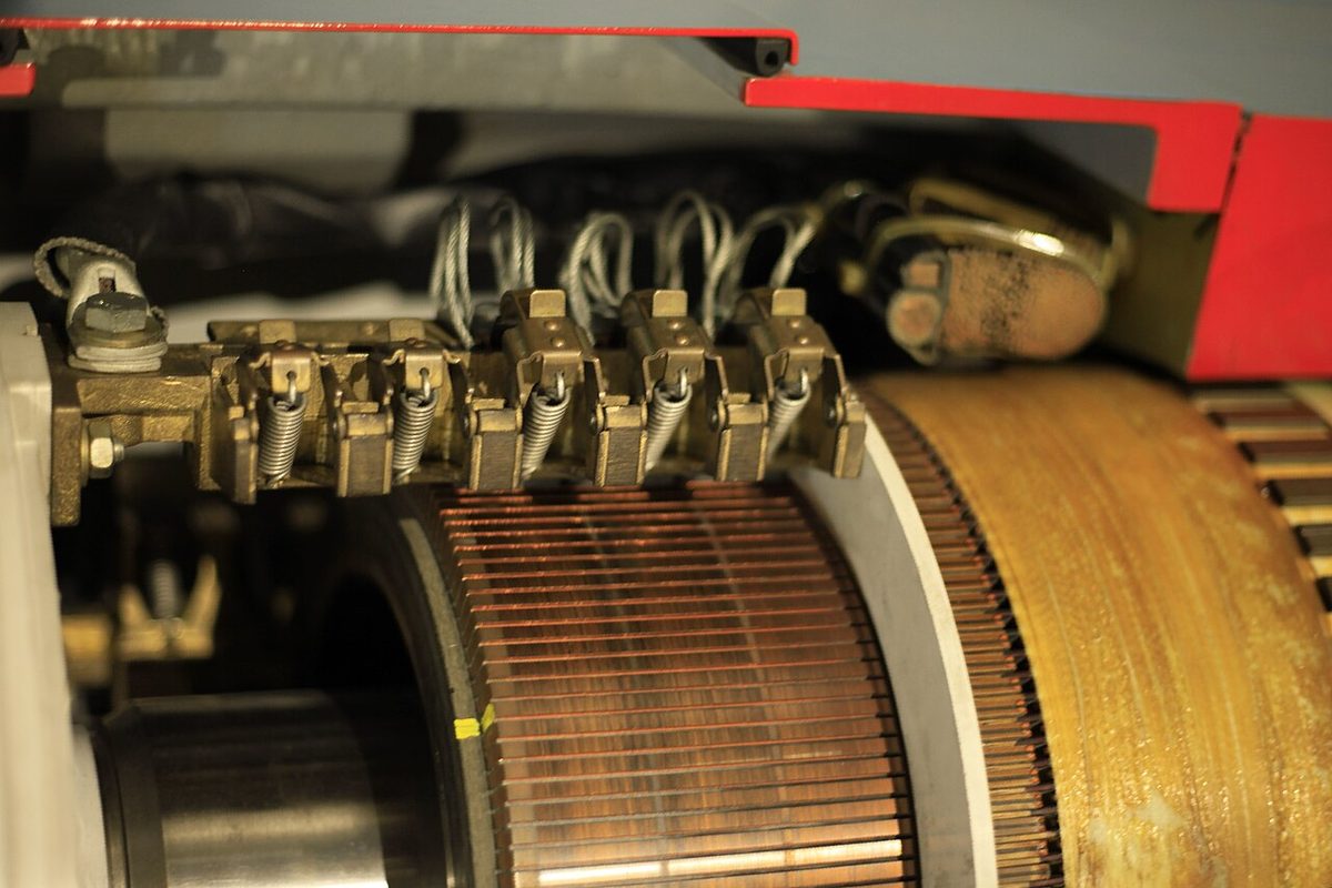 The armature of an electric machine, with the copper segments of its commutator at one end.