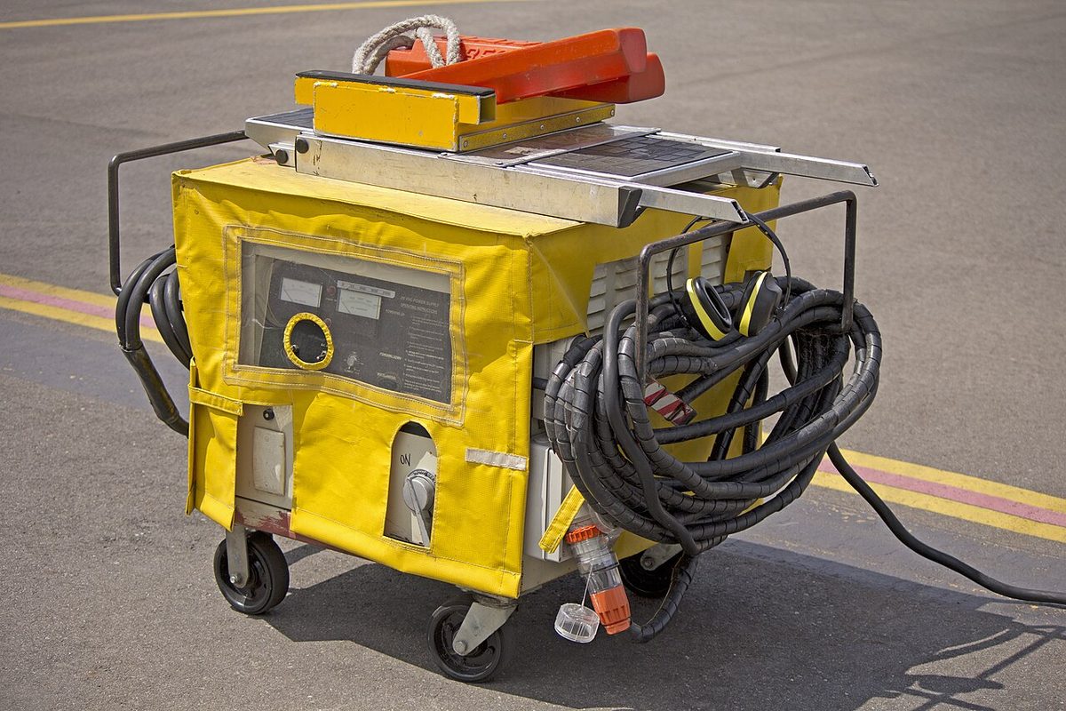 A mobile ground power unit used to supply electrical power to parked aircraft.