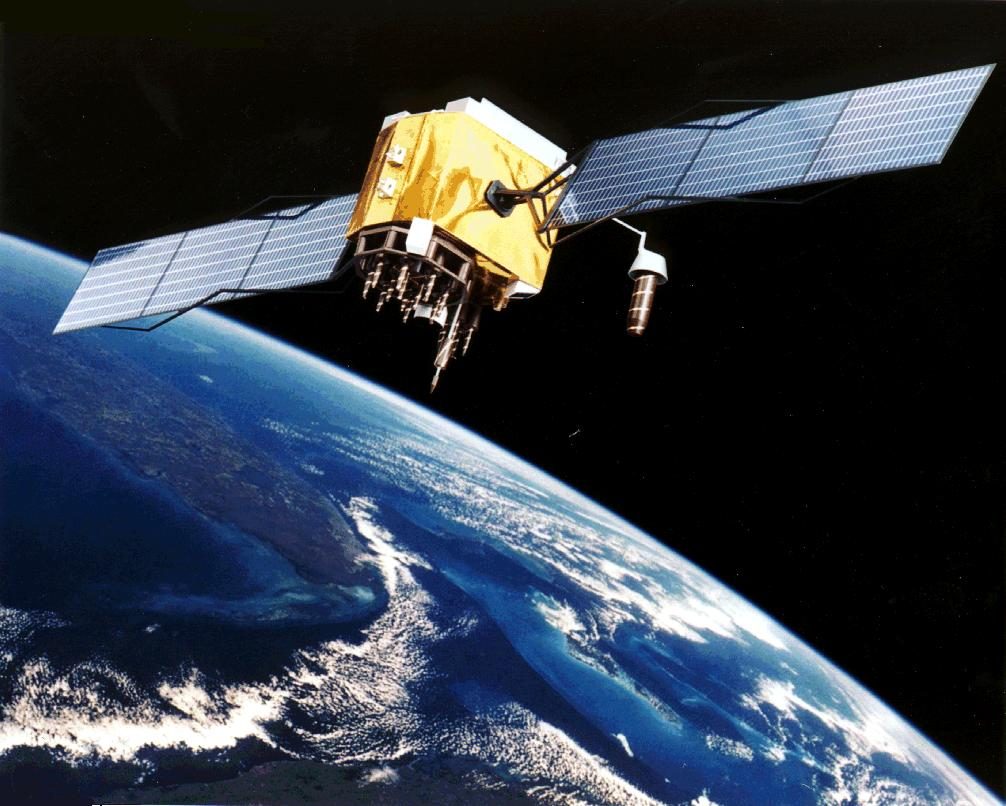 A GPS satellite in orbit, with its solar panels spread either side of the body.