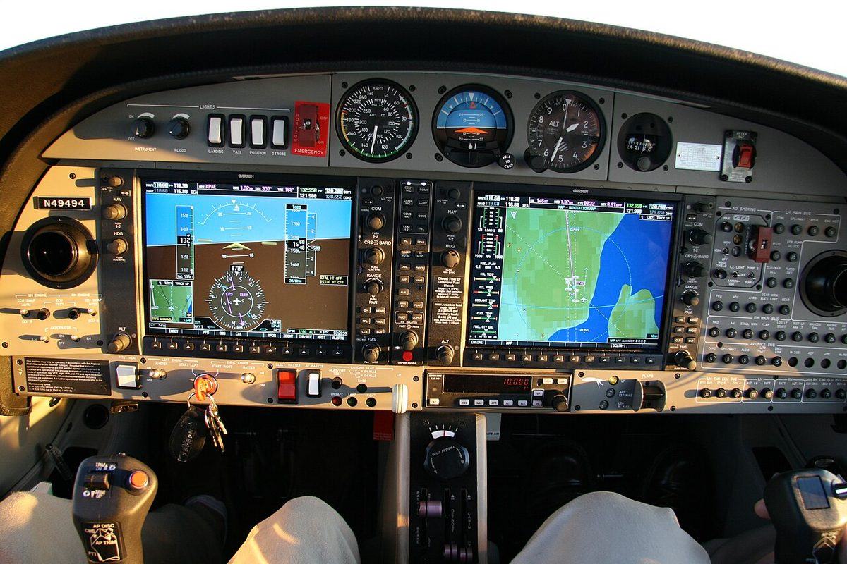 The glass cockpit of a Diamond DA42 light twin, with Garmin G1000 display screens.
