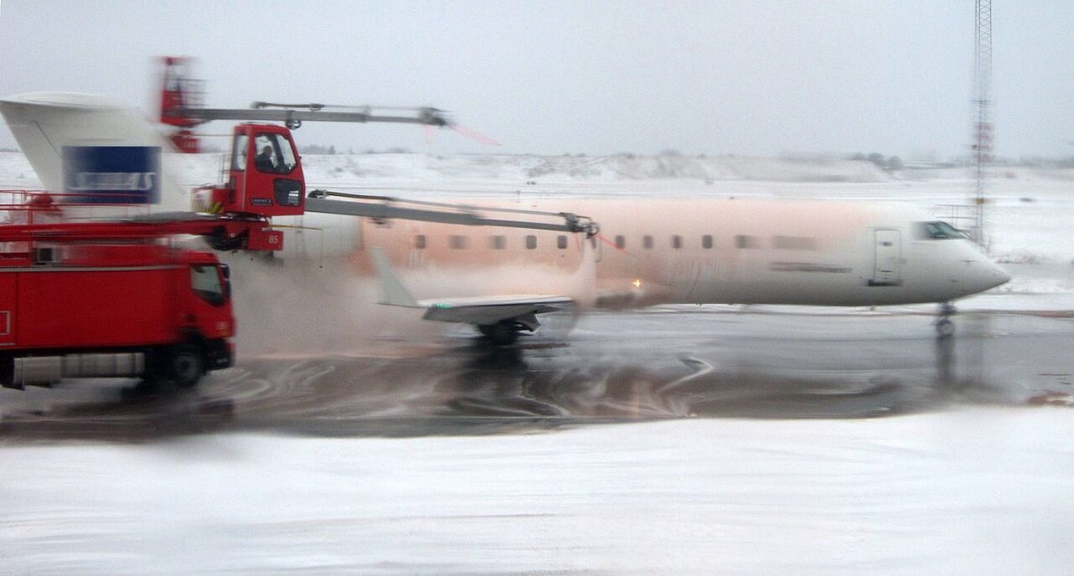 An aircraft being de-iced at Copenhagen Airport.