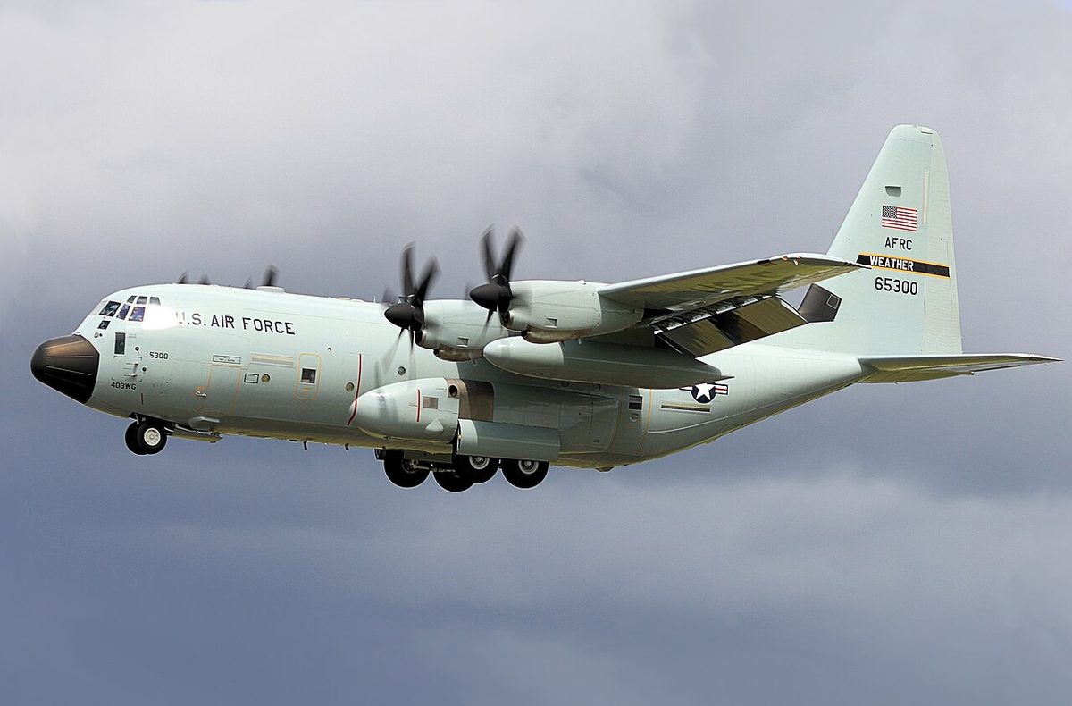 A four-engined turboprop weather reconnaissance aircraft in flight.
