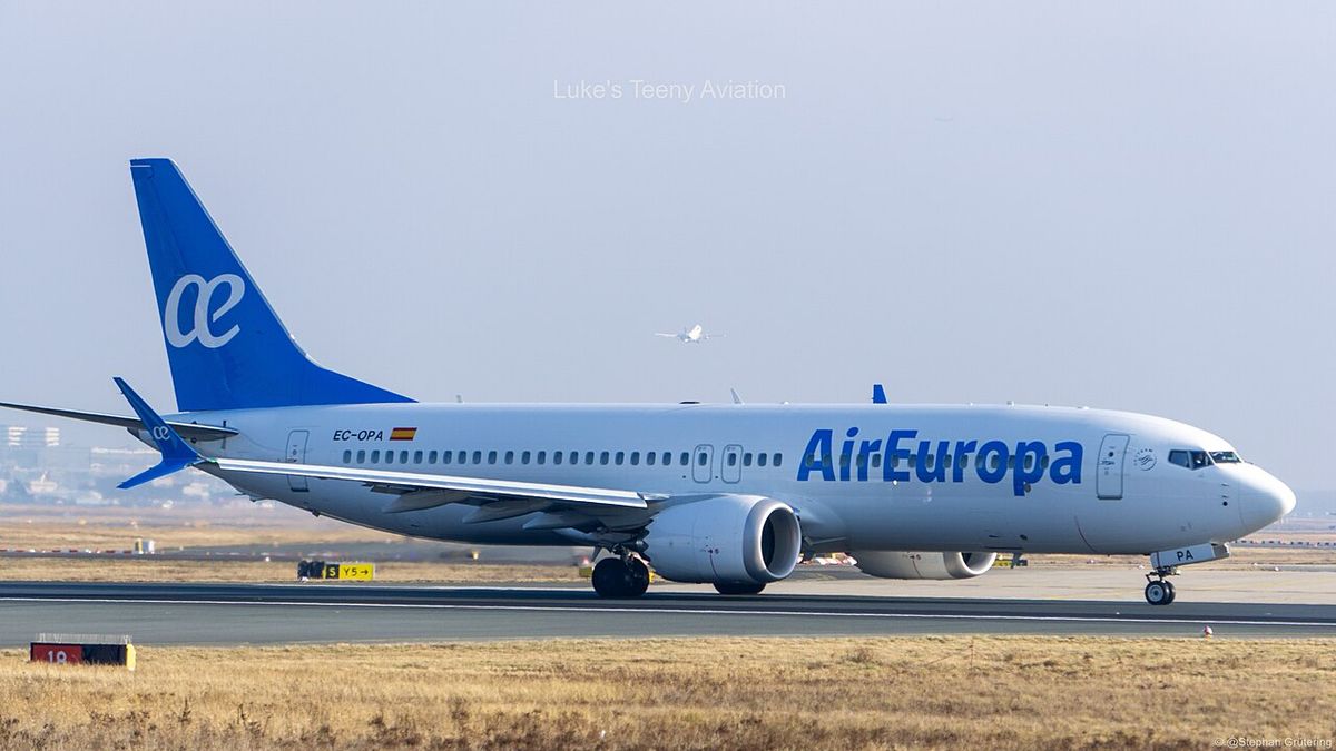 An Air Europa Boeing 737 MAX 8 in its white livery with the blue tail and the ae logo, taxiing.